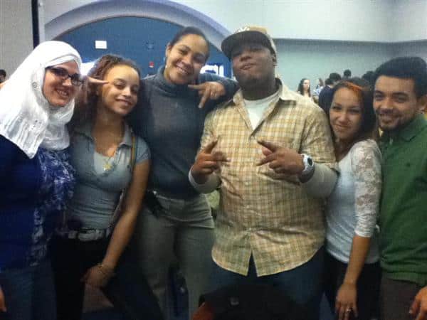 Photo Courtesy of  southernct.eduYolangely Collado (second from the left), is a member of F.L.O.W., a spoken word group on campus.