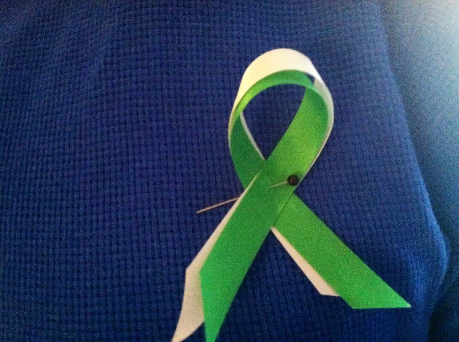 Josh Falcone | General Assignment ReporterBlue and green ribbons were worn by staff members during the forum that took place.