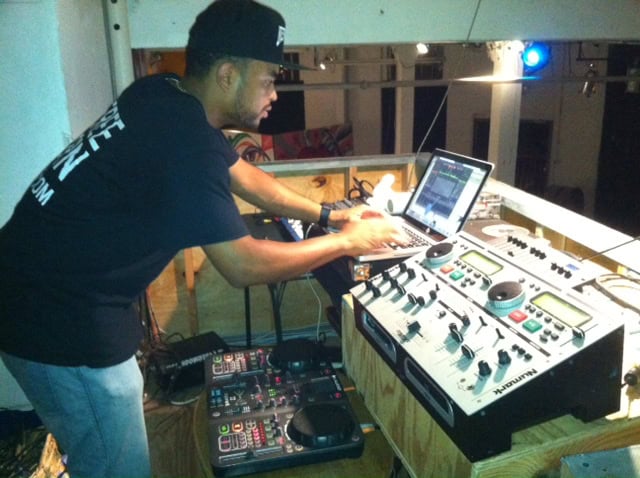 DJ Dante Capuano mixes it up for the crowd at Motivate the Mic.